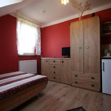 Quarto em Acomodações Particulares Pokoje Goscinne U Krysi *